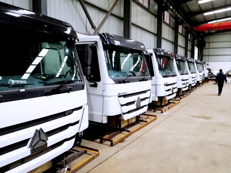 Tippers, built in Kenya, heading for their field